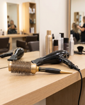 Ceramic round hair brush at salon styling station